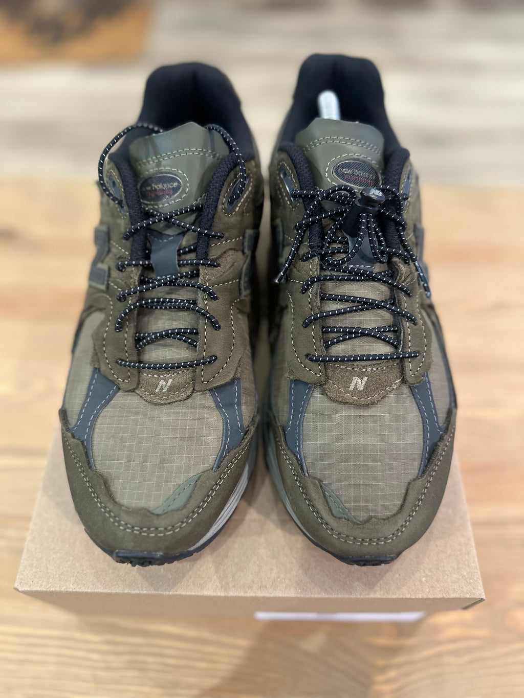 New balance 2002r protection pack dark Moss ( taille 41,5 )