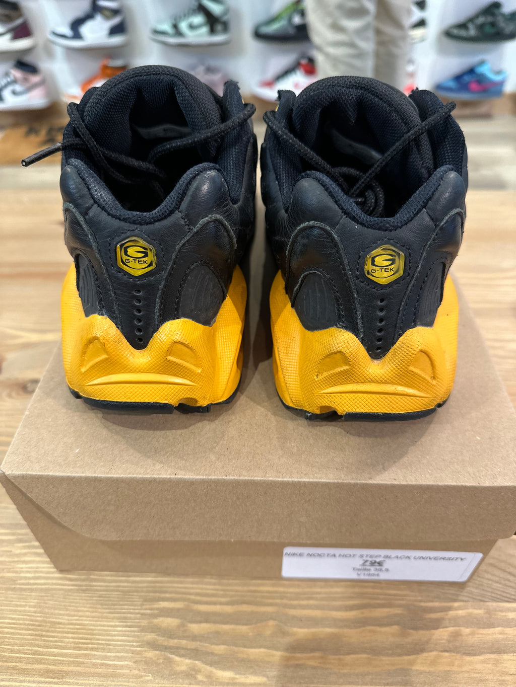Nike nocta hot step black university gold