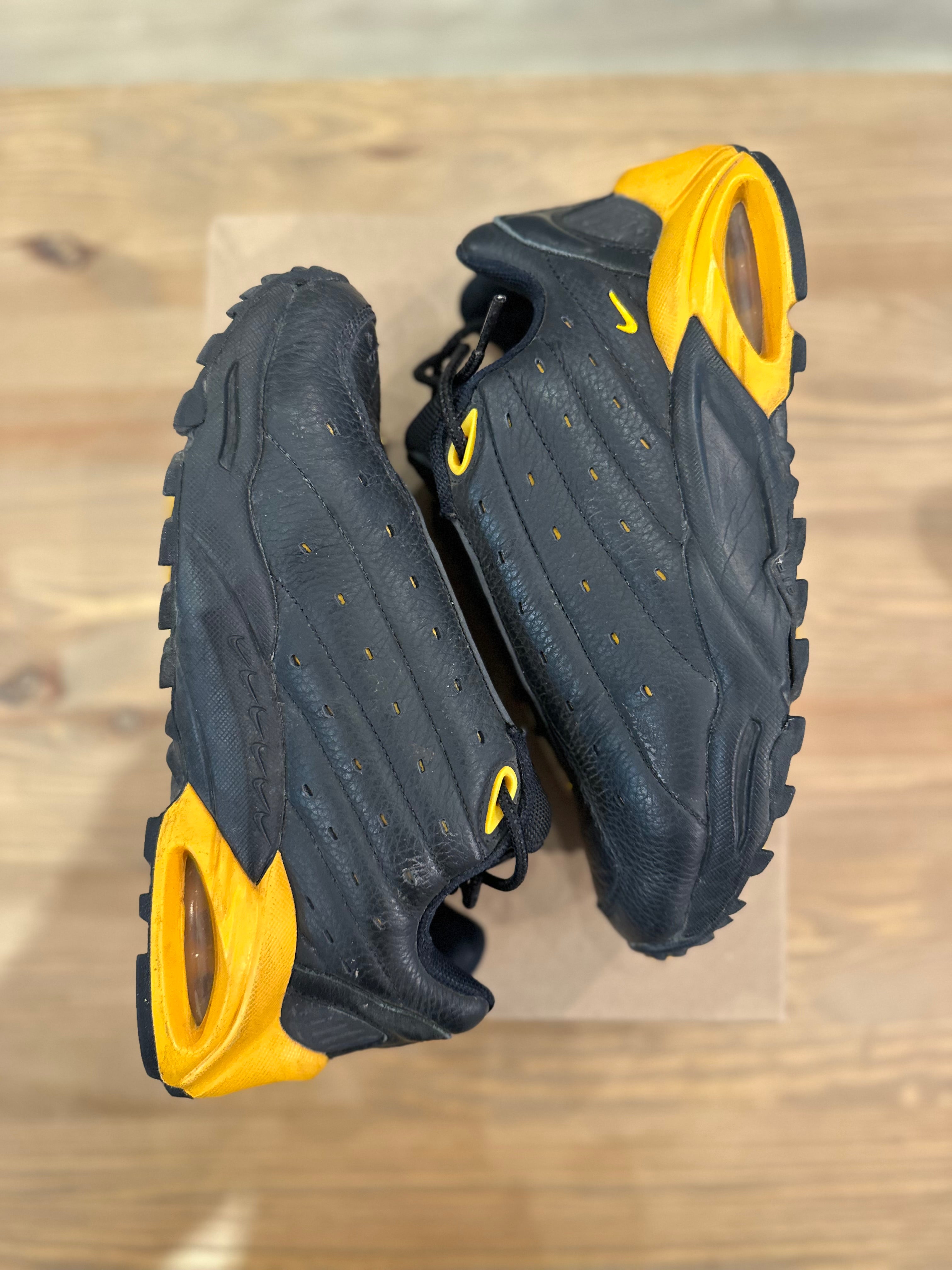 Nike nocta hot step black university gold
