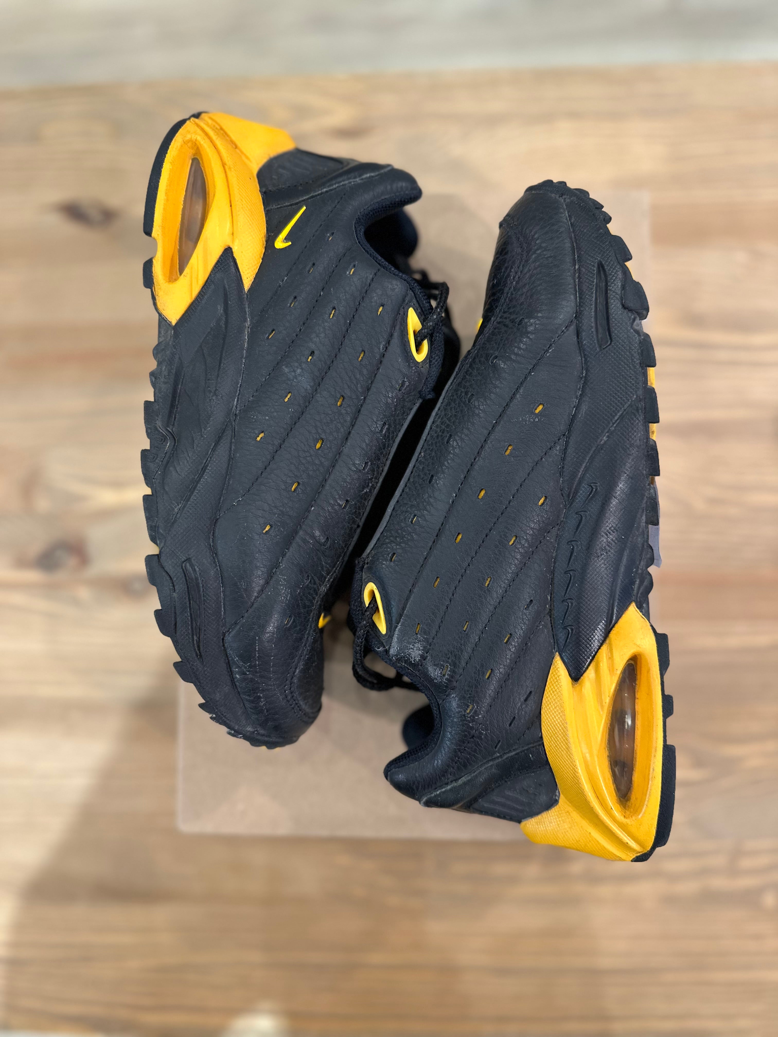 Nike nocta hot step black university gold